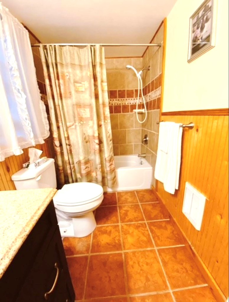 Tile in bathrooms , tub / shower in main bedroom 